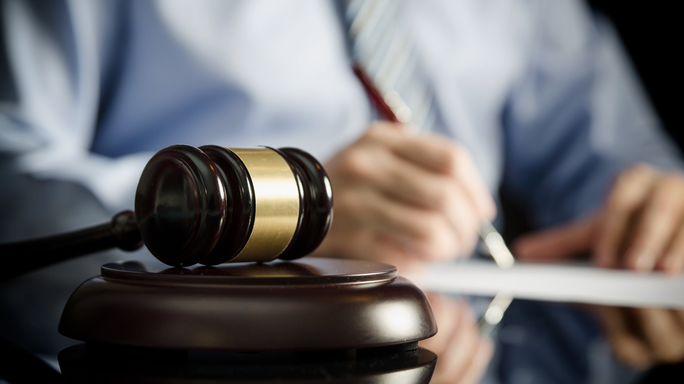 Lawyer in office with gavel