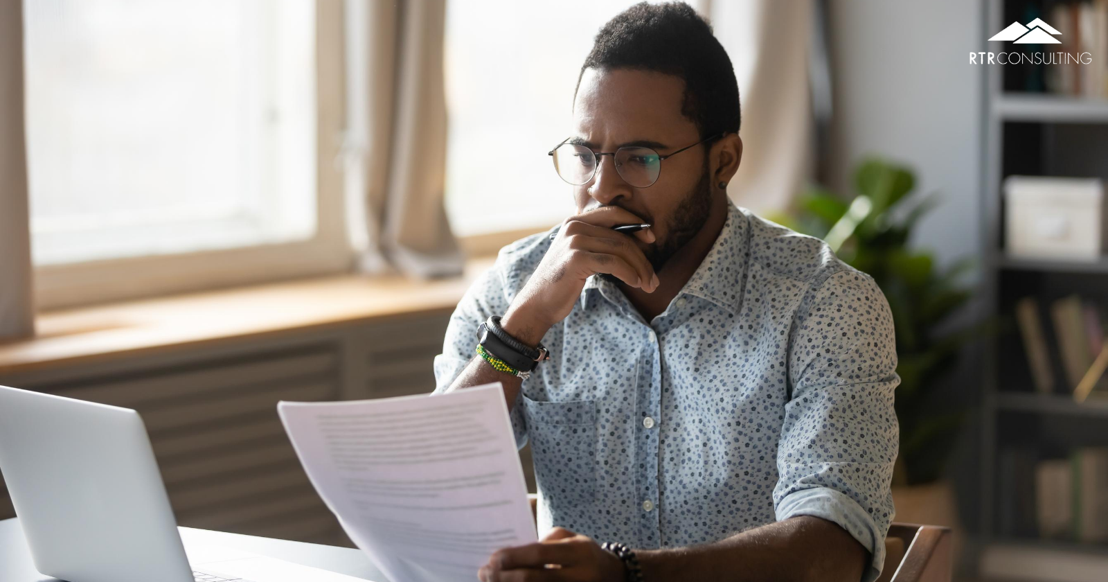 man looking at computer